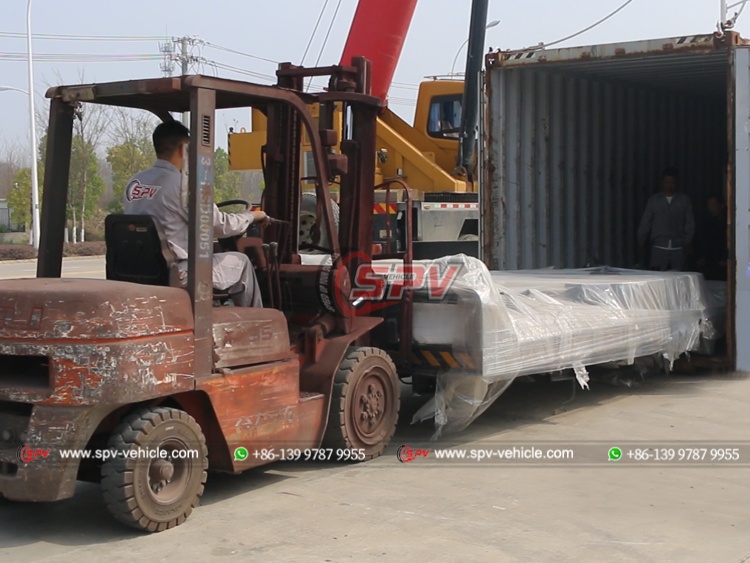 Truck Trailer Loaded into Container